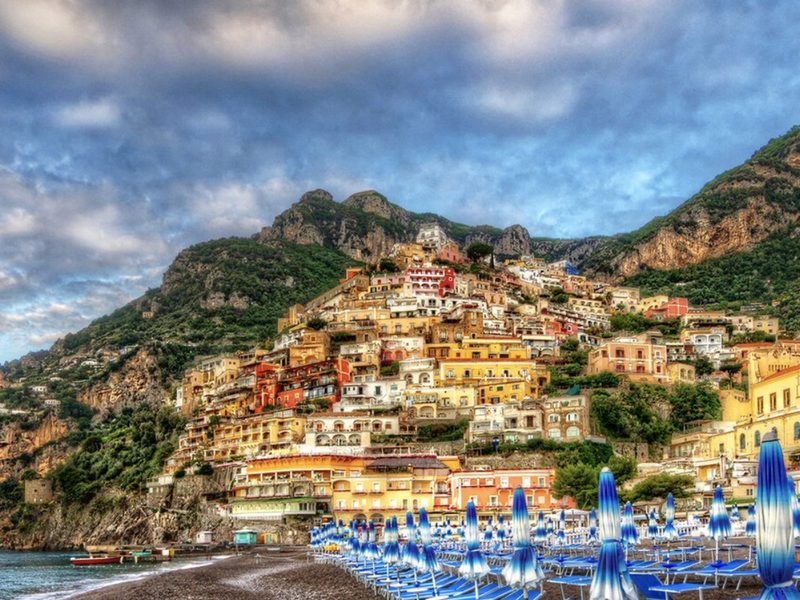 The colorful cliffside town of Positano rises above Italy's Amalfi Coast